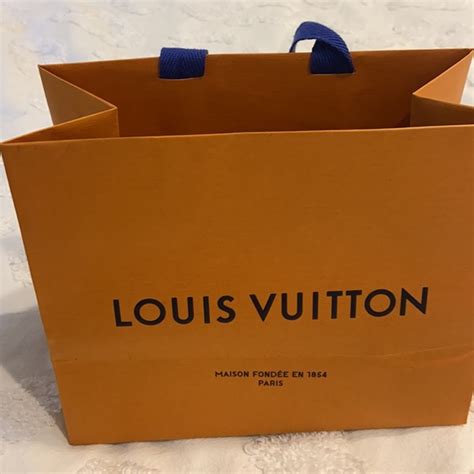 louis vuitton orange shopping bag.